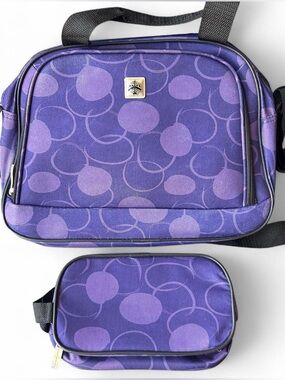 Purple polka dot carry on luggage bag with small accessory bag